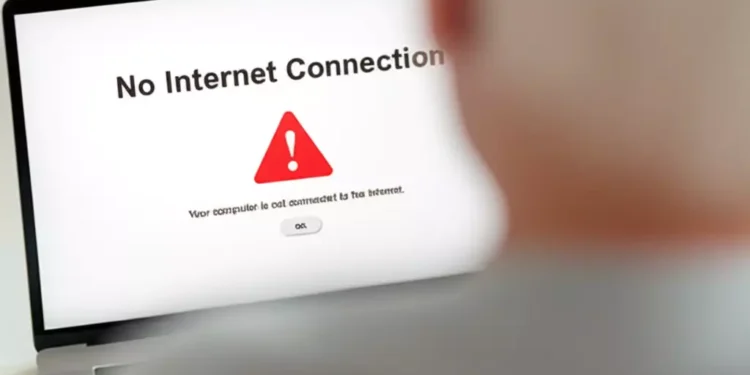 a close-up view over the shoulder of a person looking at a laptop screen