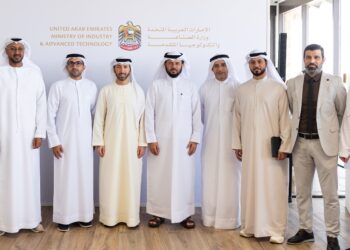 UAE Ministry of Industry and Advanced Technology officials and food industry leaders meeting at Mleiha Wheat Farm to discuss AI-powered government services for the food sector.