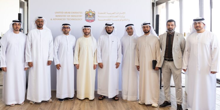 UAE Ministry of Industry and Advanced Technology officials and food industry leaders meeting at Mleiha Wheat Farm to discuss AI-powered government services for the food sector.