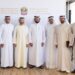 UAE Ministry of Industry and Advanced Technology officials and food industry leaders meeting at Mleiha Wheat Farm to discuss AI-powered government services for the food sector.